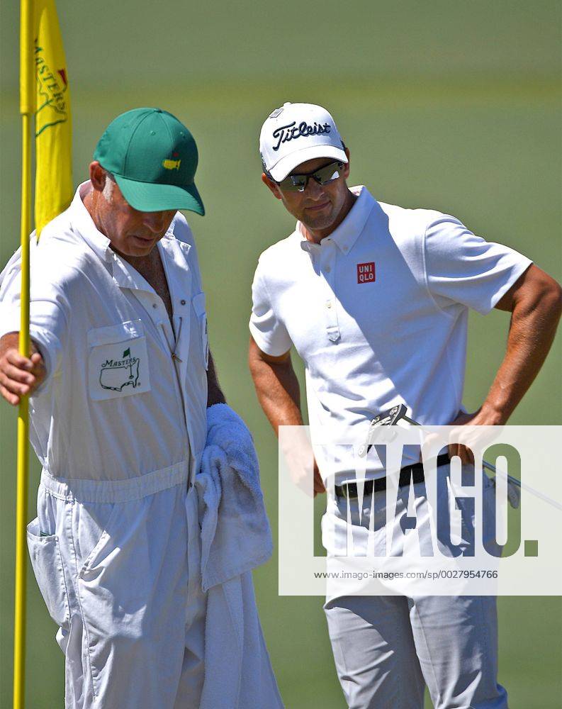 Augusta, GA, USA - Adam Scott, left and his caddie, Steve Williams, left, study his line to the pin on the second green during the final round of the Masters Tournament on Sunday, April 9, 2017 at Augusta National Golf Club in Augusta, Ga. 2017 Masters Round 4 - ZUMAm67_ 20170409_zaf_m67_040