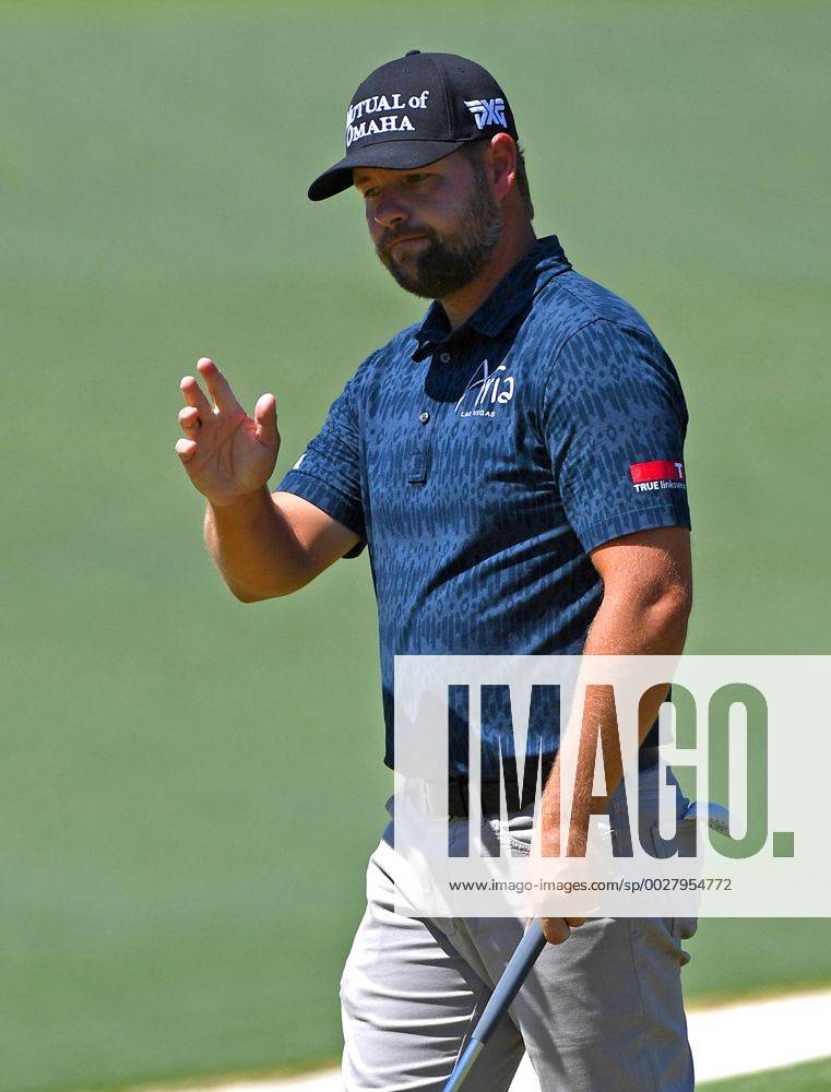 Augusta, GA, USA - Ryan Moore acknowledges the applause of the gallery after sinking a putt on the second green during the final round of the Masters Tournament on Sunday, April 9, 2017 at Augusta National Golf Club in Augusta, Ga. 2017 Masters Round 4 - ZUMAm67_ 20170409_zaf_m67_046