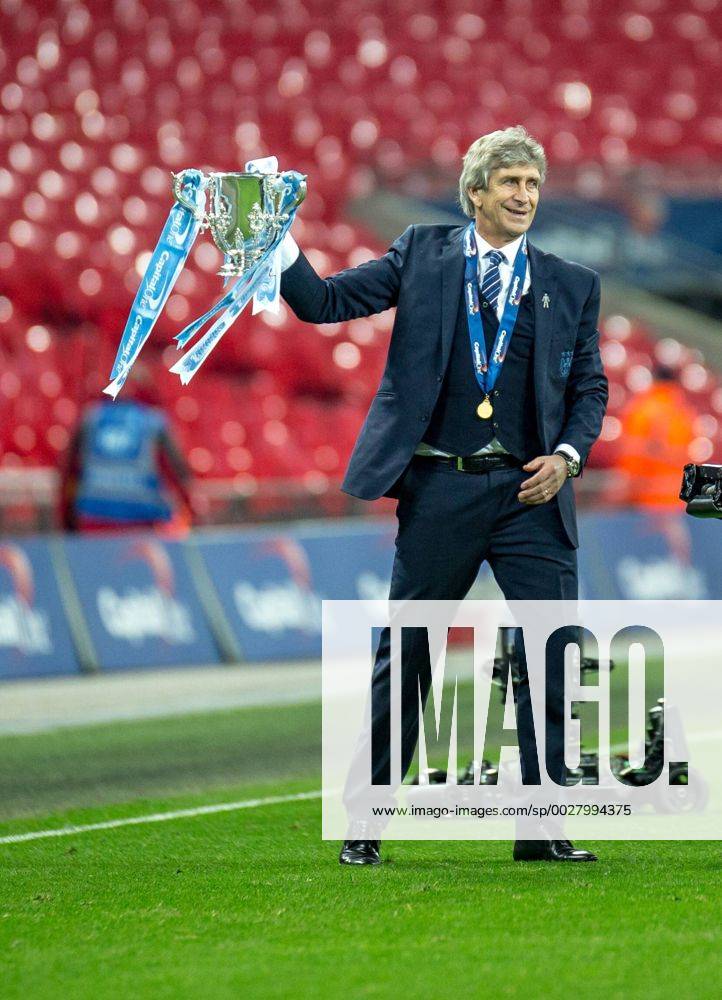 Manuel Pellegrini manager of Manchester City with the Cup during the Capital One Cup Final match between Liverpool and Manchester City at Wembley Stadium, London, on the 28th February 2016.