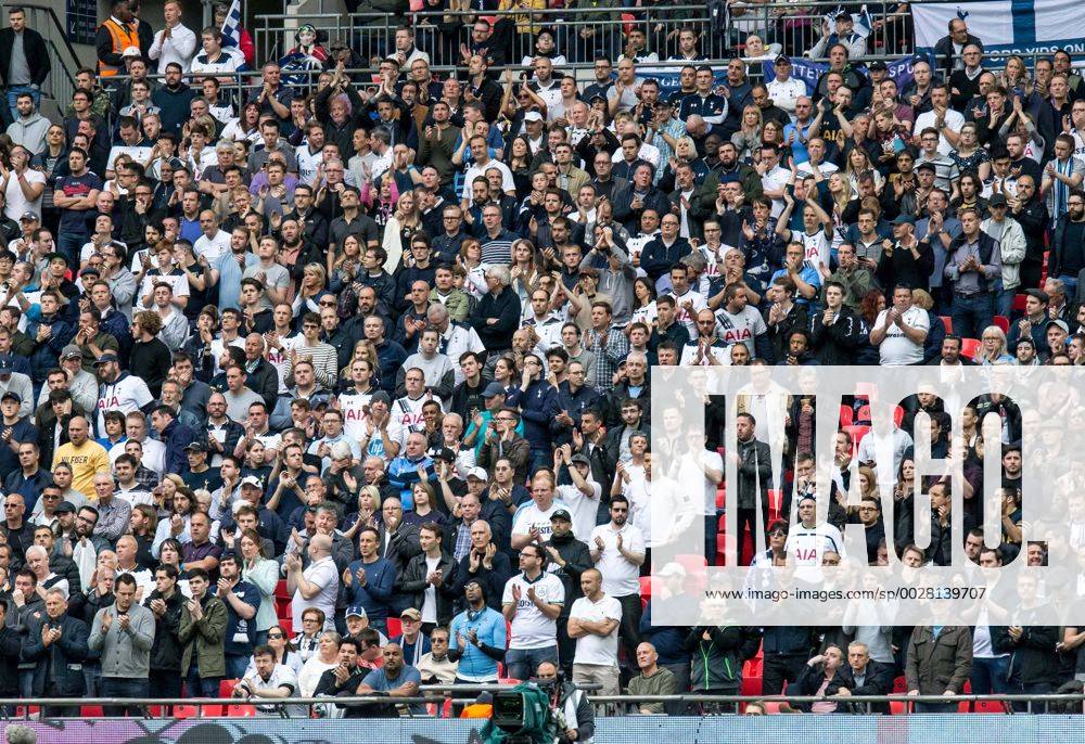 Tottenham Hotspur supporters pay an extra tribute to Ugo Ehiogu by applauding at the 44th minute mark during the the Emirates FA Cup Semi-Final match between Chelsea and Tottenham Hotspur at Wembley Stadium, London, England on the 22nd April 2017.
