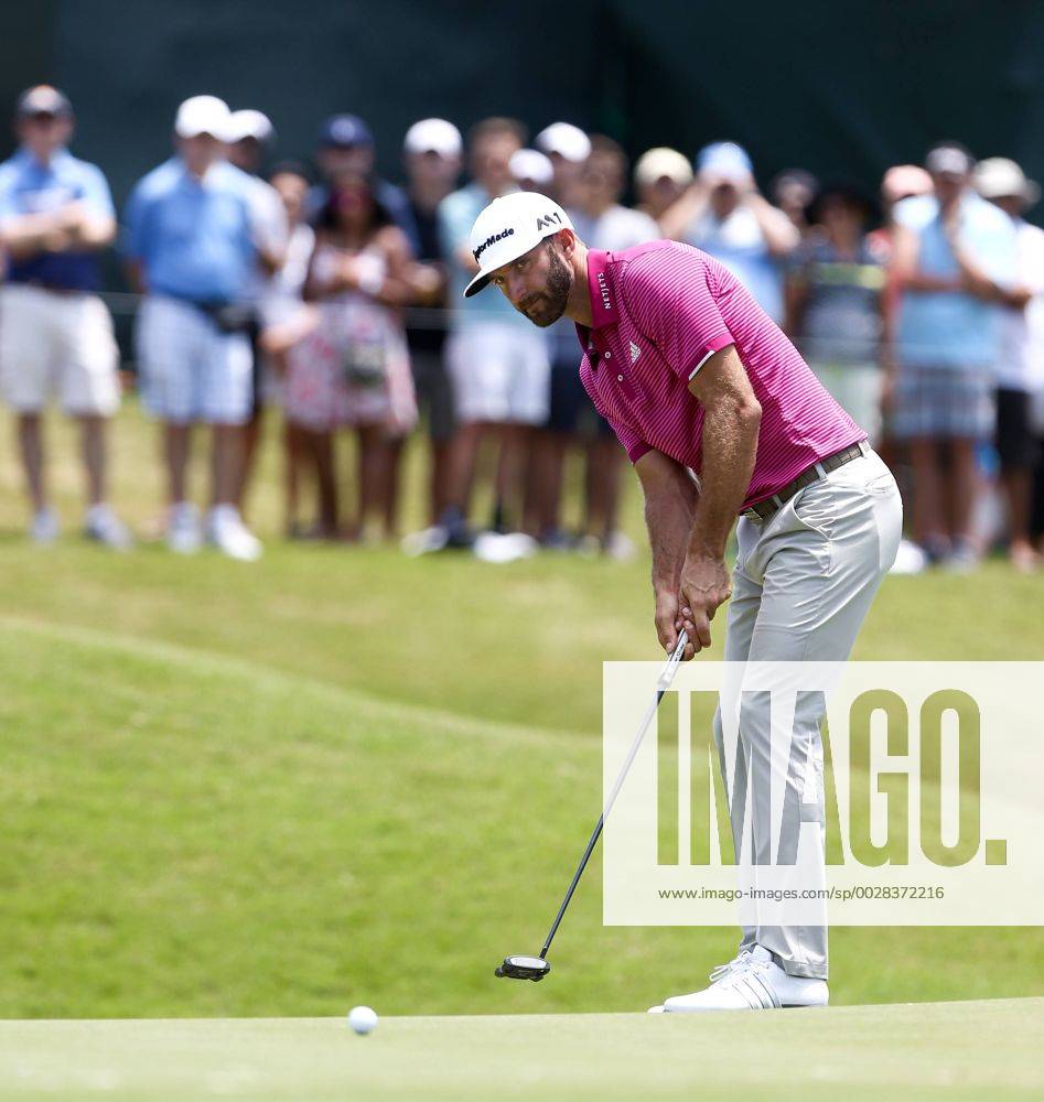 Ponte Vedra Beach, Florida, United States - Dustin Johnson putts the 9th green during the second round of The PLAYERS Championship at TPC Sawgrass. Golf 2017: The PLAYERS Championship - Round 2 - ZUMAw109 20170512_zap_w109_007
