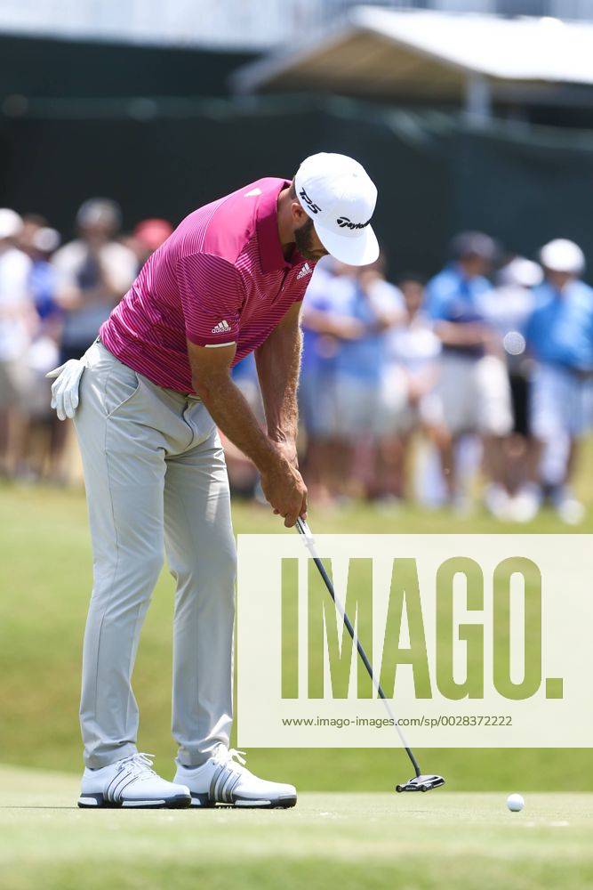 Ponte Vedra Beach, Florida, United States - Dustin Johnson putts the 9th green during the second round of The PLAYERS Championship at TPC Sawgrass. Golf 2017: The PLAYERS Championship - Round 2 - ZUMAw109 20170512_zap_w109_013