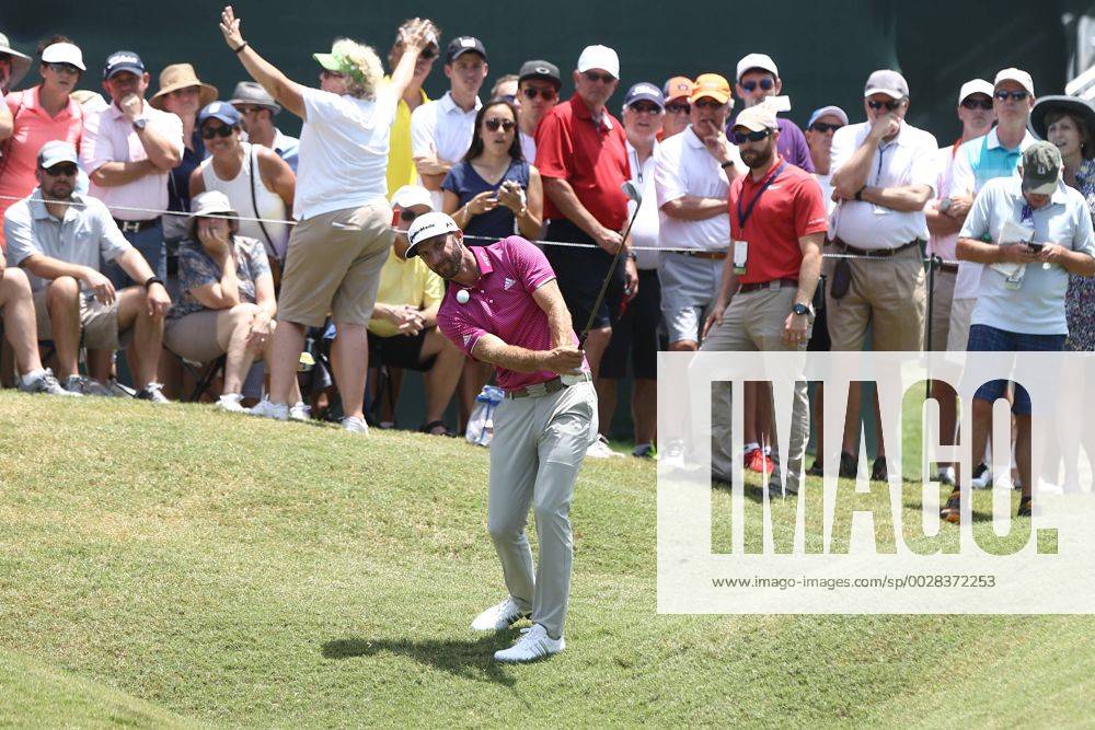 Ponte Vedra Beach, Florida, United States - Dustin Johnson chips on to the 9th green during the second round of The PLAYERS Championship at TPC Sawgrass. Golf 2017: The PLAYERS Championship - Round 2 - ZUMAw109 20170512_zap_w109_029