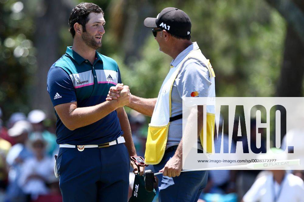 - SPORT May 12, 2017 - Ponte Vedra Beach, Florida, United States - Jon Rahm (L) shakes hands with Justin Rose s caddie Mark Fulcher on the 9th green after the second round of The PLAYERS Championship at TPC Sawgrass. Golf 2017: The PLAYERS Championship - Round 2 - ZUMAw109 20170512_zap_w109_045