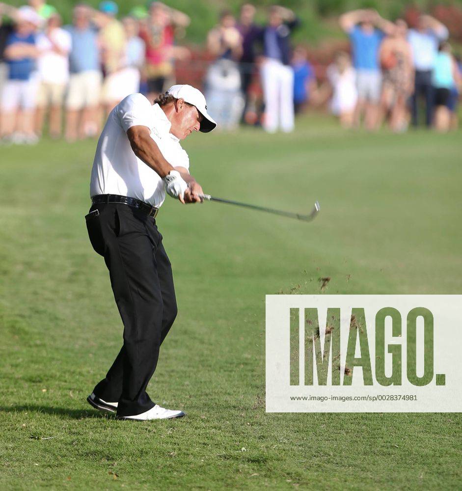 Ponte Vedra Beach, Florida, United States - Phil Mickelson hits out of the rough on the 18th fairway during the second round of The PLAYERS Championship at TPC Sawgrass. Golf 2017: The PLAYERS Championship - Round 2 - ZUMAw109 20170512_zap_w109_096