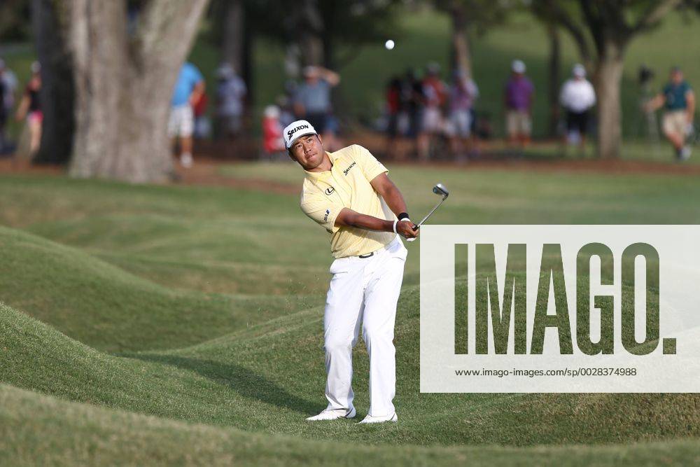 Ponte Vedra Beach, Florida, United States - Hideki Matsuyama hits out of a bunker on the 18th hole during the second round of The PLAYERS Championship at TPC Sawgrass. Golf 2017: The PLAYERS Championship - Round 2 - ZUMAw109 20170512_zap_w109_103