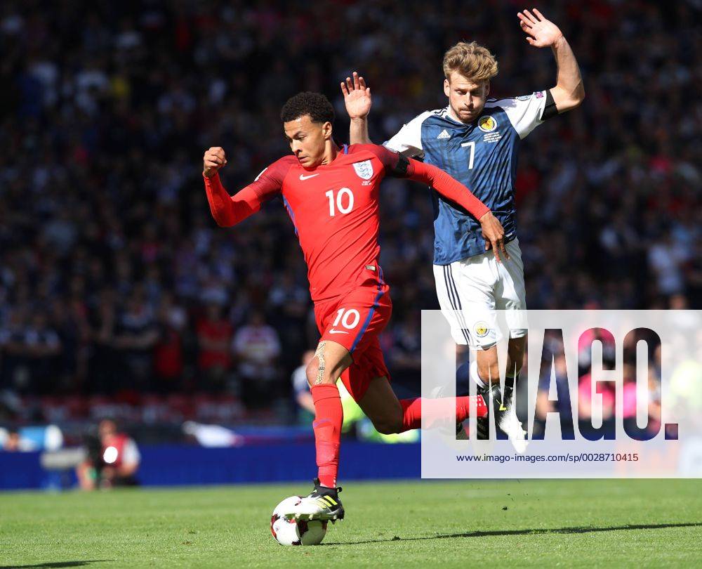Scotland s Stuart Armstrong tussles with England s Dele Alli during the FIFA World Cup WM Weltmeisterschaft Fussball Qualifying match at Hampden Park Stadium, Glasgow Picture date 10th June 2017. Picture credit should read: David Klein Sportimage .