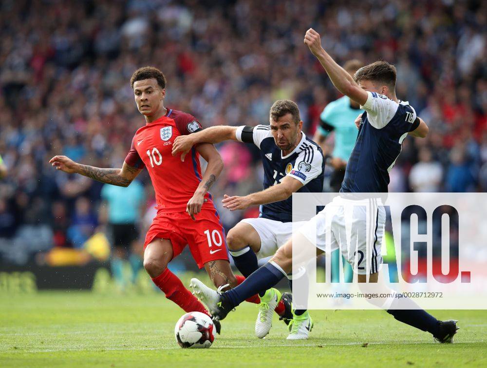 Scotland s James Morrison tussles with England s Dele Alli during the FIFA World Cup WM Weltmeisterschaft Fussball Qualifying match at Hampden Park Stadium, Glasgow Picture date 10th June 2017. Picture credit should read: David Klein Sportimage .