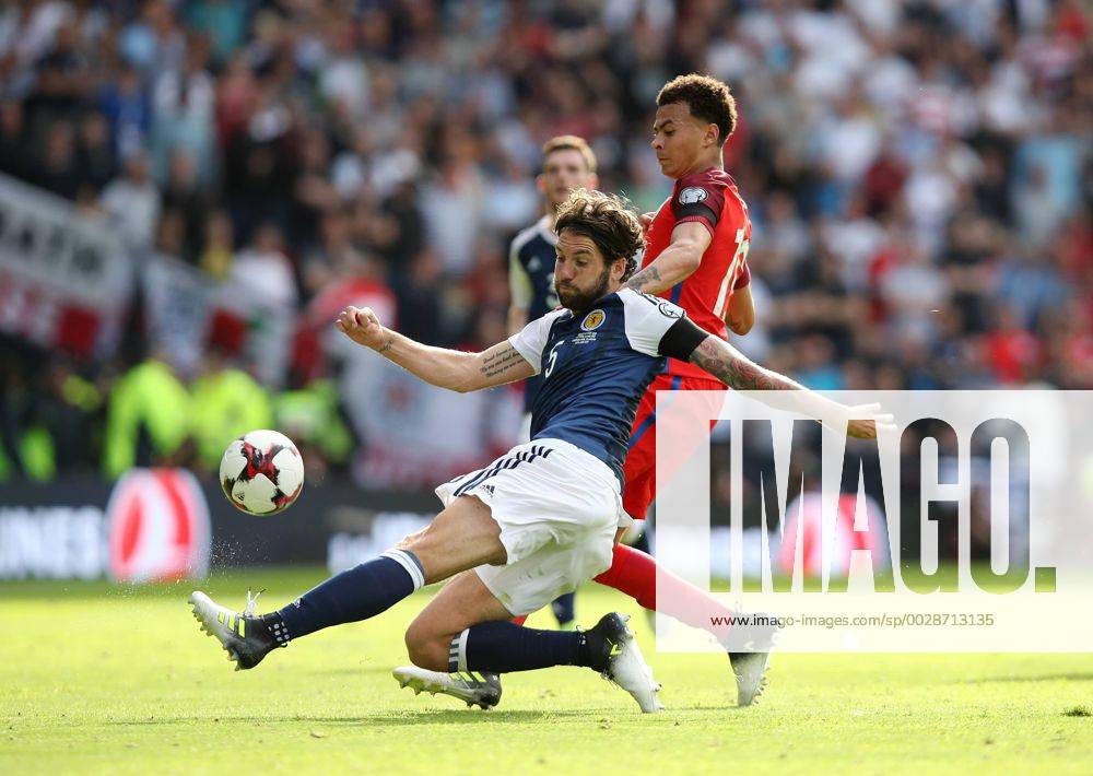 Scotland s Charlie Mulgrew tussles with England s Dele Alli during the FIFA World Cup WM Weltmeisterschaft Fussball Qualifying match at Hampden Park Stadium, Glasgow Picture date 10th June 2017. Picture credit should read: David Klein Sportimage .