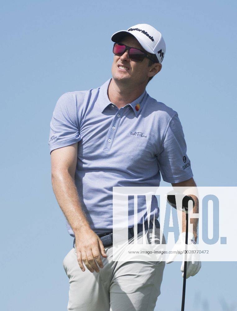 Justin Rose reacts to his drive off the 18th tee during round 2 of the 117th U.S. Open golf tournament at Erin Hill golf course in Erin, Wisconsin on June 16, 2017. WIS20170616320 KEVINxDIETSCH