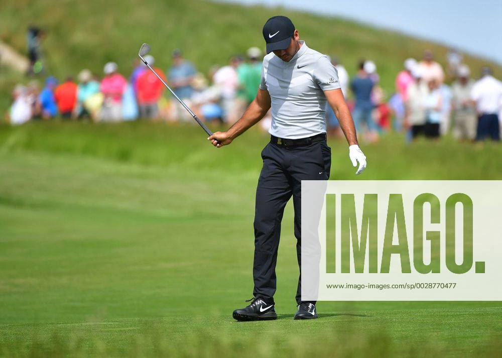 Jason Day reacts to a chip not he 17th hole during round 2 of the 117th U.S. Open golf tournament at Erin Hill golf course in Erin, Wisconsin on June 16, 2017. WIS20170616325 KEVINxDIETSCH