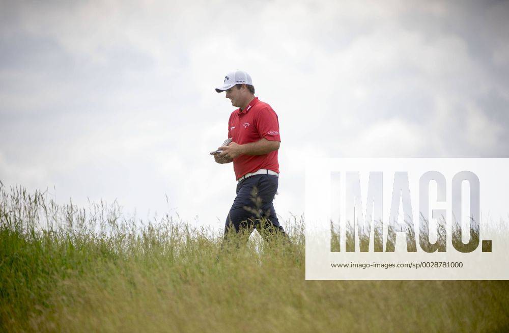 Patrick Reed walks on the 17th fairway during round 3 of the 117th U.S. Open golf tournament at Erin Hill golf course on June 17, 2017 in Erin, Wisconsin. WIS20170617310 KEVINxDIETSCH