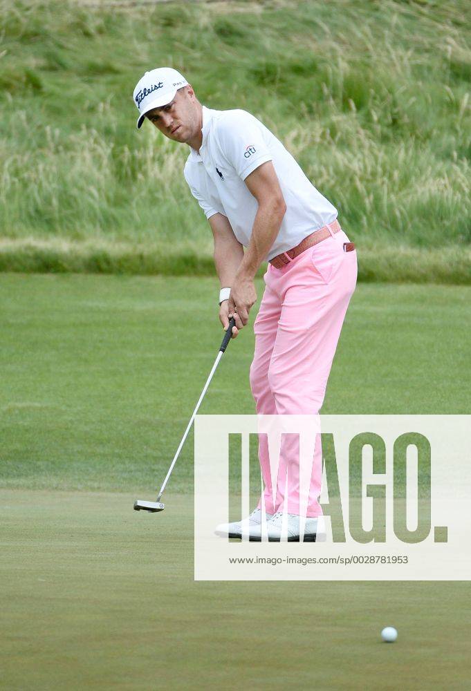 Justin Thomas attempts a par putt on the 10th hole during round 3 of the 117th U.S. Open golf tournament at Erin Hill golf course on June 17, 2017 in Erin, Wisconsin. Thomas missed the put and scored a bogey on the hole. WIS20170617107 BRIANxKERSEY
