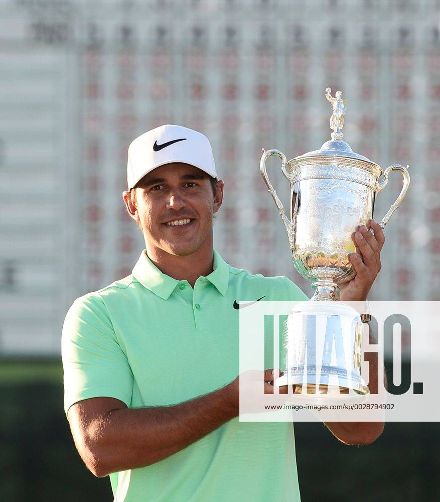 - SPORT Brooks Koepka poses with the U.S. Open Trophy after the final round of the 117th U.S. Open golf tournament at Erin Hills golf course on June 18, 2017 in Erin, Wisconsin. Koepka shot a 16-under-par 272 to win the tournament by 4 strokes. WIS20170618105 BRIANxKERSEY
