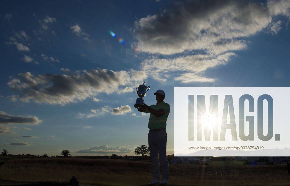 Brooks Koepka poses with the trophy after winning the 117th U.S. Open golf tournament at Erin Hills golf course on June 18, 2017, in Erin, Wisconsin. Koepka posted a final score of 16-under-par. WIS20170618313 KEVINxDIETSCH