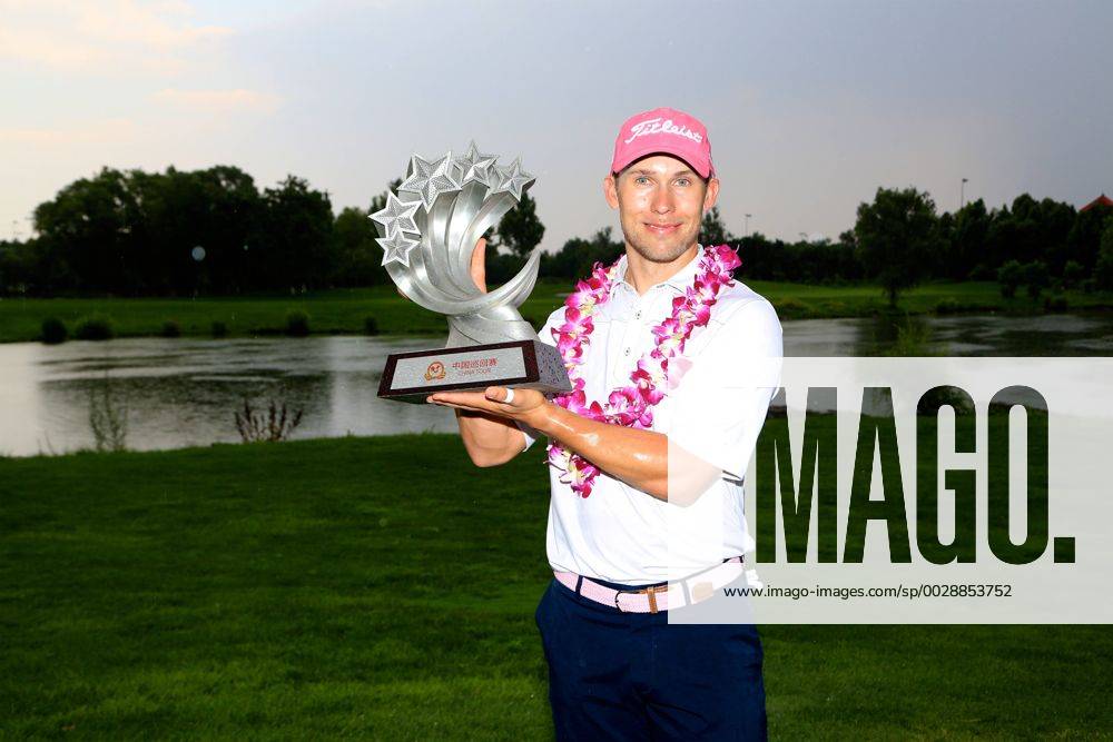Bryden Macpherson of Australia poses with his trophy after winning the final round of the 2017 Fragrant Hills International Beijing Open golf tournament in Beijing, China, 25 June 2017. Australian golfer Bryden Macpherson ranked the top on the China Tour Order of Merit this week when the second event of the newly formed circuit s 2017 season gets underway in Beijing. The Tour recently cut ties with the PGA Golf Herren TOUR and is now run by the China Golf Association with ties to both the European and Asian Tours. The Fragrant Hills International Beijing Open, which is the second stop on the China Tour, is set to welcome 141 players from 17 countries when it tees off from June 22-25. Bryden Macpherson titles Fragrant Hills International Beijing Open 20170625_32387
