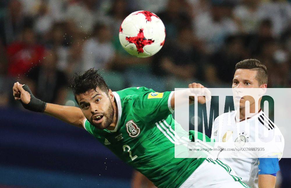 Mexico s Nestor Araujo (L) and Germany s Julian Draxler fight for the ball in their 2017 FIFA Confederations Cup semifinal football match at Fisht Stadium. Artyom Korotayev TASS TS055834