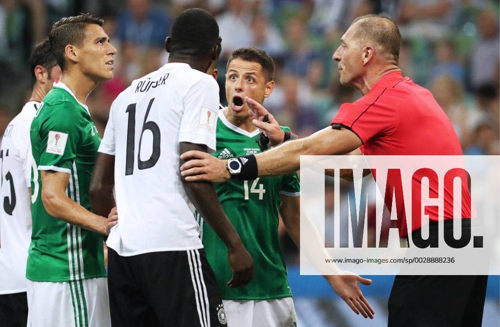 Mexico s Hector Moreno, Germany s Antonio Ruediger, Mexico s Javier Hernandez, and referee Nestor Pitana (L-R) seen during their 2017 FIFA Confederations Cup semifinal football match at Fisht Stadium. Germany won the game 4-1. Artyom Korotayev TASS TS055842