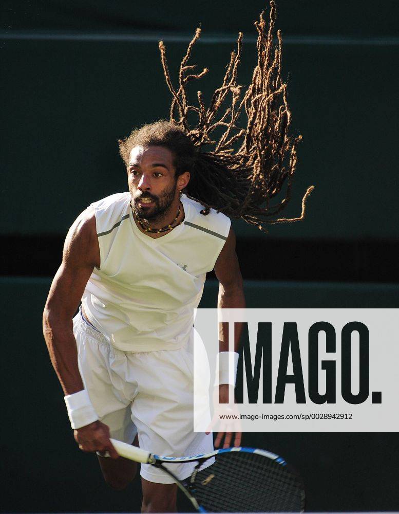Tennis - 2017 Wimbledon Championships - Week One, Wednesday Day Three Mens Singles, Second Round match Andy Murray (GBR) vs Dustin Brown (GER) Dustin Brown on Centre court COLORSPORT ANDREW COWIE