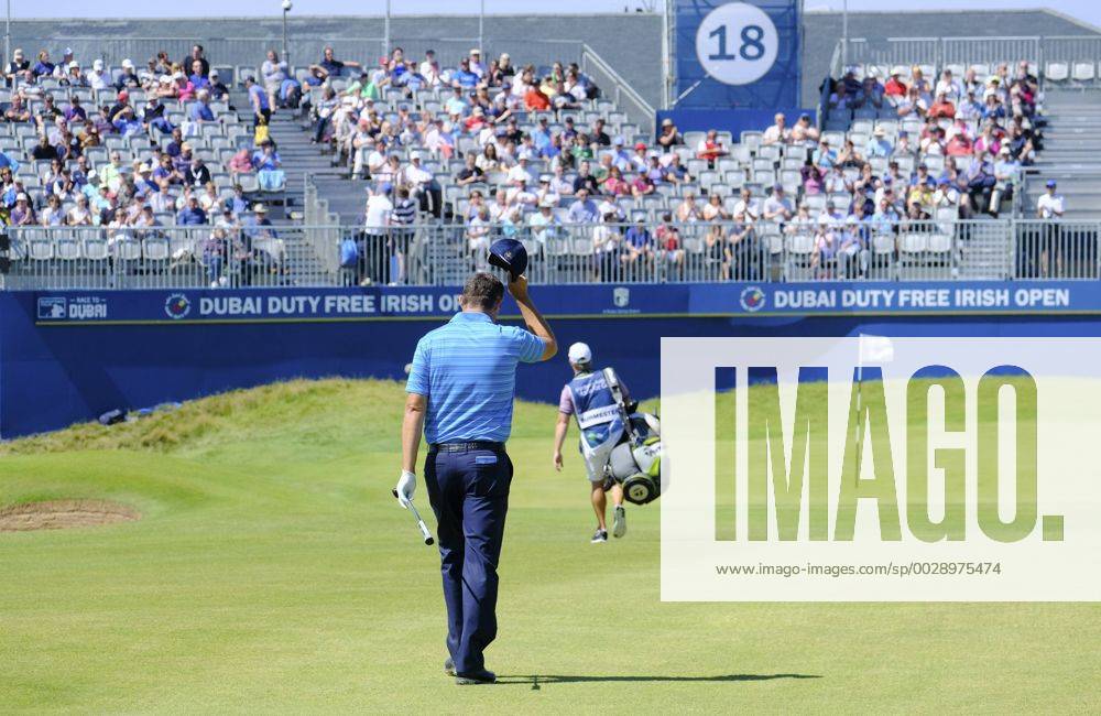 July 8th 2017, Portstewart Golf Club, Portstewart, Northern Ireland; Dubai Duty Free Irish Open Golf Championship, Day 3; Padraig Harrington (IRL) acknowledges the grandstand crowd as he makes his way towards the 18th green during the third round of the Dubai Duty Free Irish Open Cookex ActionPlus11898994