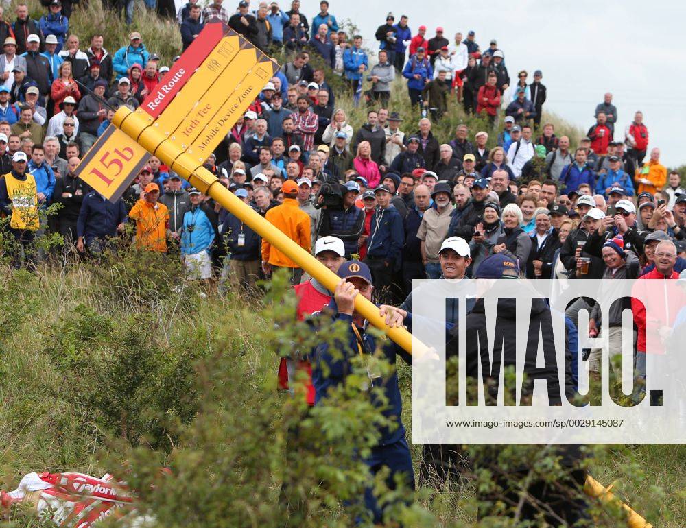 - SPORT 21st July 2017, Royal Birkdale Golf Club, Southport, England; The 146th Open Golf Championship, second round; Rory McIlroy looks on as the signpost blocking the line of his second shot is removed after his errant tee shot on the par five 15th Blunsdenx ActionPlus11904475
