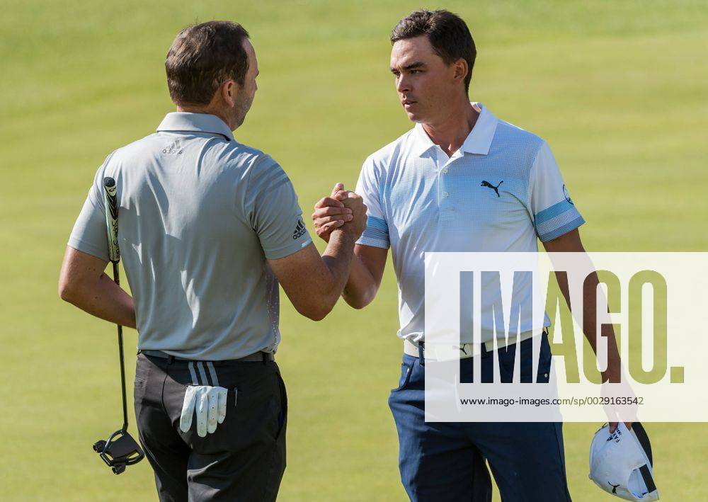 22nd July 2017, Royal Birkdale Golf Club, Southport, England; The 146th Open Golf Championship, third round ; Sergio Garcia (ESP) and Rickie Fowler (USA) shake hands on the 18th green Blunsdenx ActionPlus11905242