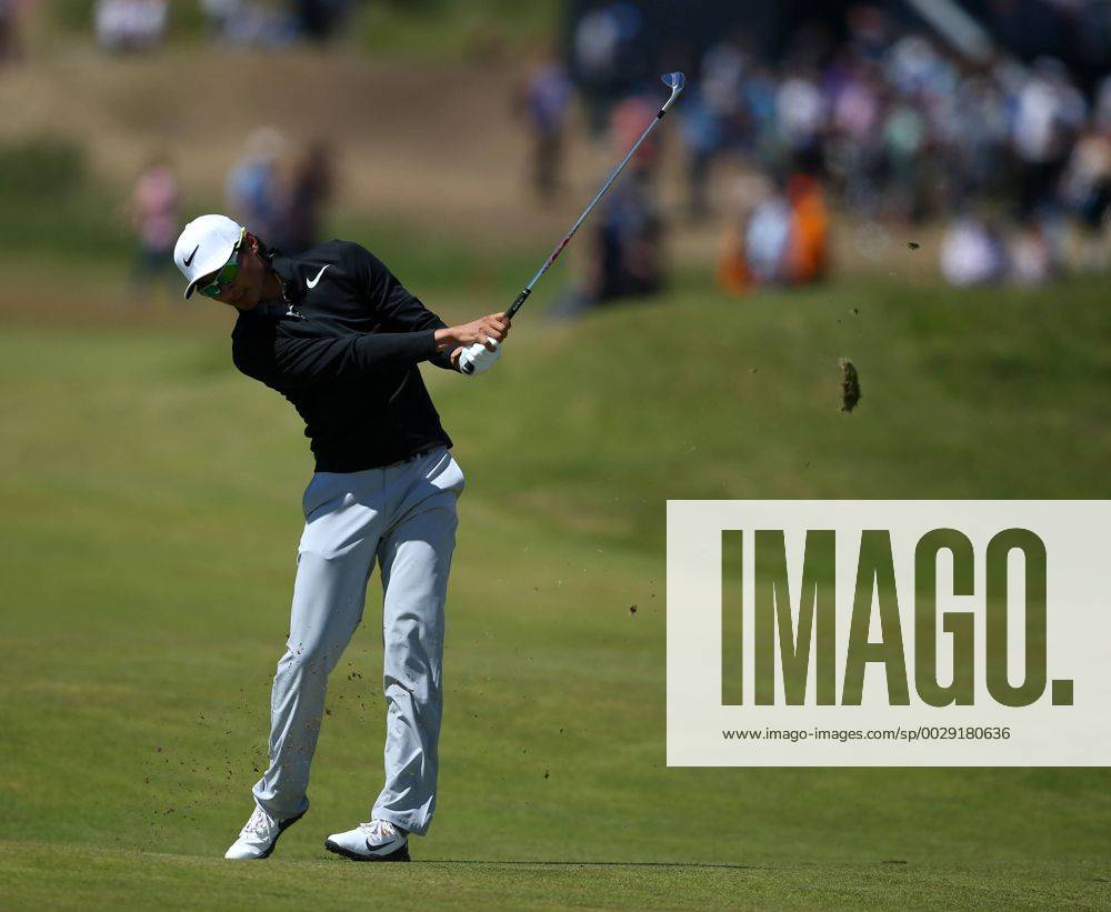23rd July 2017, Royal Birkdale Golf Club, Southport, England; The 146th Open Golf Championship, fourth round ; Haotong Li hits his approach shot from the 8th fairway Blunsdenx ActionPlus11905764