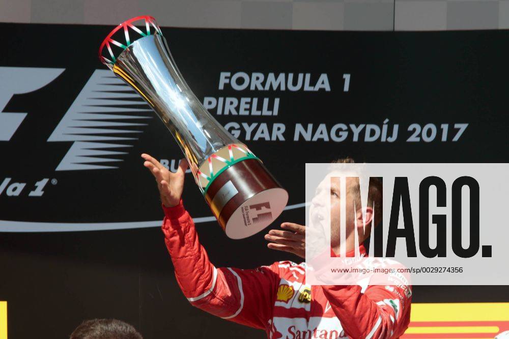 FORMULA 1 - Hungarian GP BUDAPEST,HUNGARY,30.JUL.17 - MOTORSPORTS, FORMULA 1 - Grand Prix of Hungary, Hungaroring. Image shows Sebastian Vettel (GER Ferrari). Keywords: award ceremony, trophy. GEPAxpictures Mueller