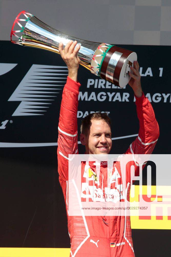 FORMULA 1 - Hungarian GP BUDAPEST,HUNGARY,30.JUL.17 - MOTORSPORTS, FORMULA 1 - Grand Prix of Hungary, Hungaroring. Image shows Sebastian Vettel (GER Ferrari). Keywords: award ceremony, trophy. GEPAxpictures Mueller