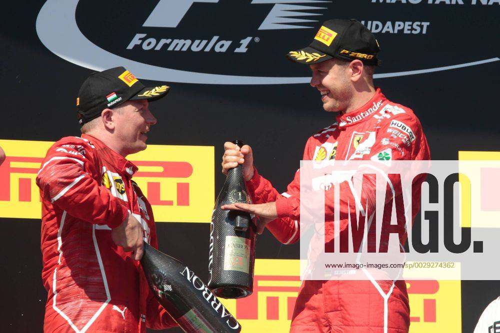 FORMULA 1 - Hungarian GP BUDAPEST,HUNGARY,30.JUL.17 - MOTORSPORTS, FORMULA 1 - Grand Prix of Hungary, Hungaroring. Image shows Kimi Raikkoenen (FIN Ferrari) and Sebastian Vettel (GER Ferrari). Keywords: award ceremony, champagne shower. GEPAxpictures Mueller