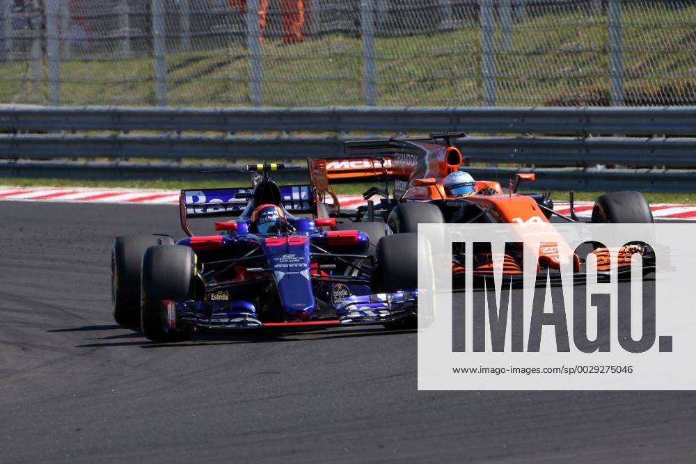 Hungarian Grand Prix, Hungaroring 27 - 30 July 2017 30.07.2017 - Race, Carlos Sainz Jr (ESP) Scuderia Toro Rosso STR12 and Fernando Alonso (ESP) McLaren MCL32