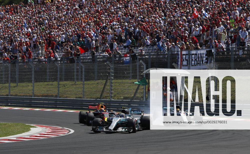 Motorsports: FIA Formula One World Championship WM Weltmeisterschaft 2017, Grand Prix of Hungary, 77 Valtteri Bottas (FIN, Mercedes AMG Petronas F1 Team), 44 Lewis Hamilton (GBR, Mercedes AMG Petronas F1 Team), 33 Max Verstappen (NLD, Red Bull Racing), Budapest Hungary ZWEIx