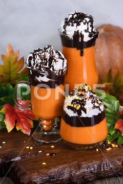 Pumpkin chocolate beverage with whipped cream and chocolate topping Pumpkin, chocolate, topping, whipped cream, cream, latte, dessert, autumn, smoothie, beverages, food, drink, cocktail, glass, flavor, taste, consumption, festivity, celebration, gourmet, tasting, saturated, transparent, portion, Buffet, Banquet, dinner, goblet, holiday, feast, Tipple, Fresh, Muddled, puree, sweets, fructose, pulp, organic, Dainty, homemade, Yummy, Buttercream, luncheon, brunch, lunch, vegetable, Edible, Vertically shot
