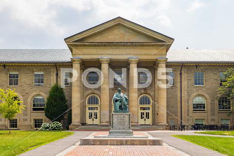 Sunny exterior view of Goldwin Smith Hall of Cornell University at Ithaca, New York 2021, Cornell University, Goldwin Smith Hall, Ithaca, architecture, building, campus, city, downtown, education, exterior, historical, landmark, new york, no people, outdoor, travel, united states, urban
