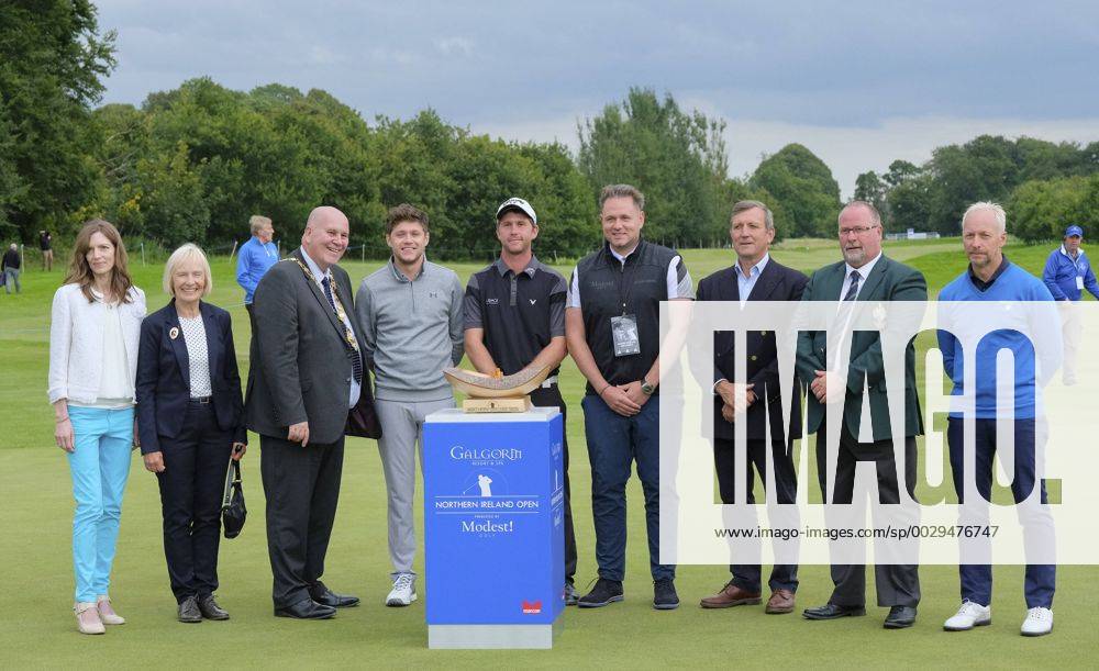 August 13th 2017, Galgorm Castle Golf Club, Galgorm, Northern Ireland; Northern Ireland Open, 4th Round, The Sunday Shootout; Robin Sciot-Siegrist (FRA) stands with the VIP guests after receiving the NI Open trophy Cookex ActionPlus11916354