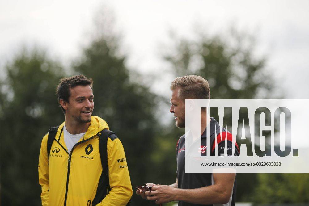 Jolyon Palmer of Great Britain and Renault F1 Team and Kevin Magnussen of Denmark and Haas F1 Team are seen in the paddock during the Formula 1 Grand Prix of Belgium at Circuit de Spa-Francorchamps, Stavelot, Belgium on 24 August 2017.
