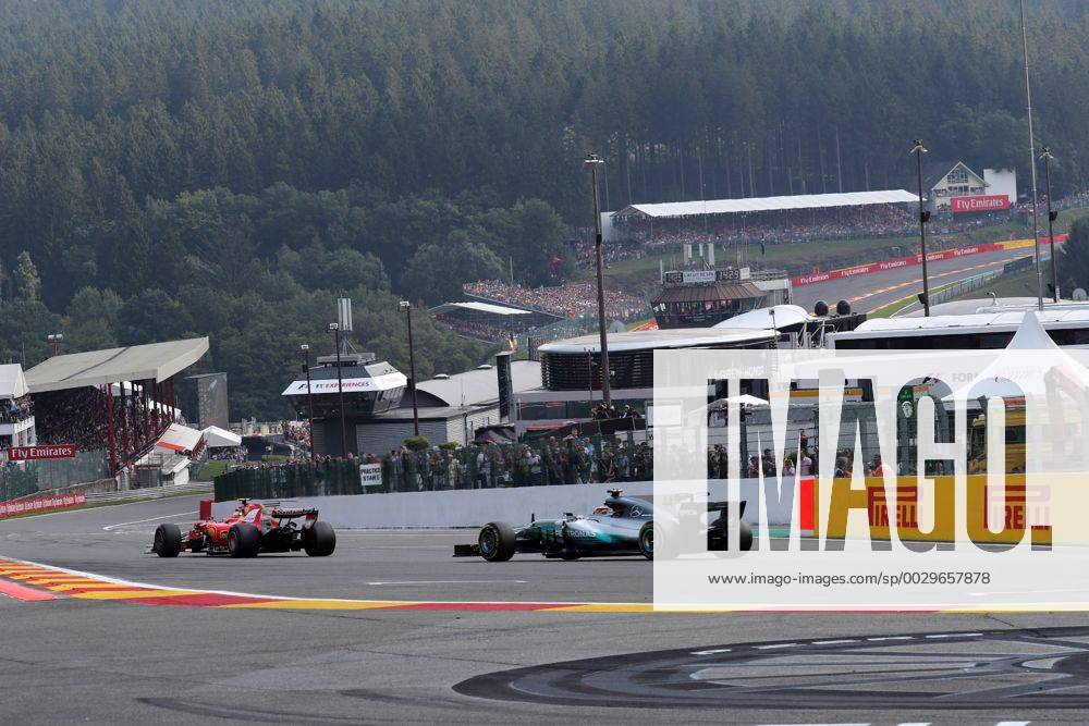 Race, Kimi Raikkonen (FIN) Scuderia Ferrari SF70H and Lewis Hamilton (GBR) Mercedes AMG F1 W08 Belgian Grand Prix, Spa-Francorchamps 24 - 27 August 2017 27.08.2017 - Race, Kimi Raikkonen (FIN) Scuderia Ferrari SF70H and Lewis Hamilton (GBR) Mercedes AMG F1 W08