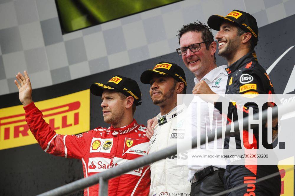(Left to Right) Sebastian Vettel of Germany and Scuderia Ferrari, Lewis Hamilton of Great Britain and Mercedes AMG Petronas F1 Team and Daniel Ricciardo of Australia and Red Bull Racing during the Formula 1 Grand Prix of Belgium at Circuit de Spa-Francorchamps, Stavelot, Belgium on 27 August 2017.