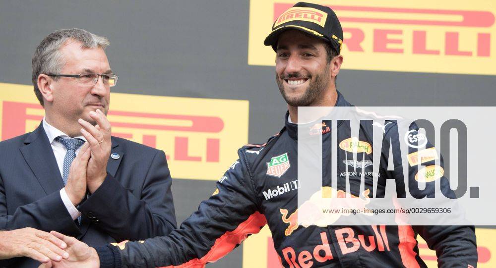 Walloon vice-minister president and minister of Economy, Employment and Formation Pierre-Yves Jeholet congratulates Red Bull s Australian driver Daniel Ricciardo on podium after the Spa-Francorchamps Formula One Grand Prix of Belgium race, in Spa-Francorchamps, Sunday 27 August 2017. BENOITxDOPPAGNE x05153297x