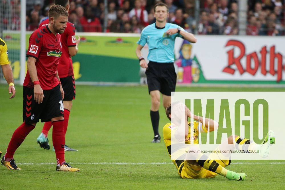 SC Freiburg Borussia Dortmund 09 09 2017 Germany Football Bundesliga Season 17 18 SC Freiburg Borussia Dortmund Photo Herbert Rudel Marcel Schmelzer Dortmund injured at Bottom right After Foul from Yoric Rave left Freiburg