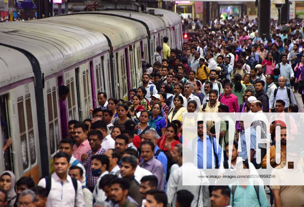 Commuters wait on a platform to board a local train, on World Population Day 2023, at CSMT, on July 11, 2023 in Mumbai, India. World Population Day is an annual event, observed on July 11 every year, which seeks to raise awareness of global population issues. The event was established by the Governing Council of the United Nations Development Programme in 1989. (Photo by Bhushan Koyande Hindustan Times ) World Population Day 2023