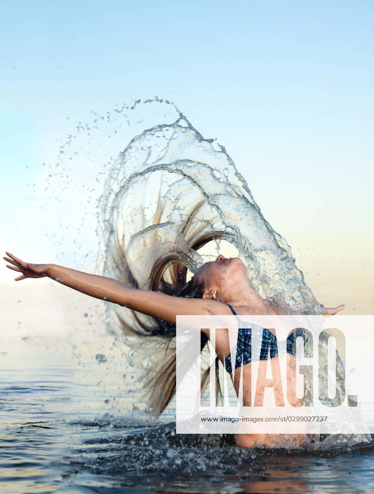 Blonde woman on water bckground beautiful blonde bikini woman on water bckground ,model released, Symbolfoto