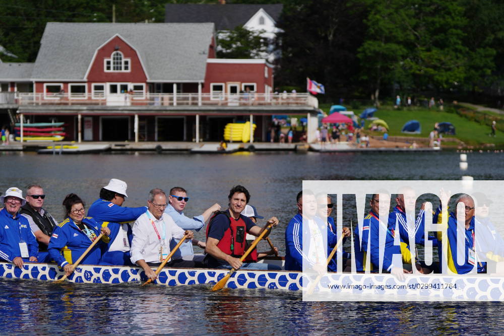 Prime Minister Justin Trudeau, centre, joins chiefs and other dignitaries in paddling across Lake Banook prior to Canoe Kayak competition at the North American Indigenous Games 2023 in Halifax, N.S. on Monday, July 17, 2023. Halifax Canada - ZUMAc35_ 20230717_zaf_c35_064