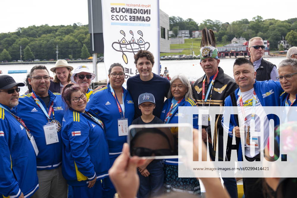 Prime Minister Justin Trudeau, centre, and his son Hadrien, centre bottom, pose with chiefs and other Indigenous dignitaries prior to the Canoe Kayak competition at the North American Indigenous Games 2023 in Halifax, Monday, July 17, 2023. Halifax Canada - ZUMAc35_ 20230717_zaf_c35_073