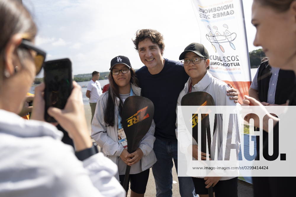 Prime Minister Justin Trudeau, centre, poses with athletes prior to Canoe Kayak competition at the North American Indigenous Games 2023 in Halifax, Monday, July 17, 2023. Halifax Canada - ZUMAc35_ 20230717_zaf_c35_074