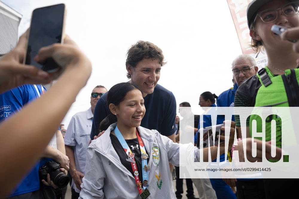 Prime Minister Justin Trudeau, centre, poses with athletes prior to Canoe Kayak competition at the North American Indigenous Games 2023 in Halifax, Monday, July 17, 2023. Halifax Canada - ZUMAc35_ 20230717_zaf_c35_075