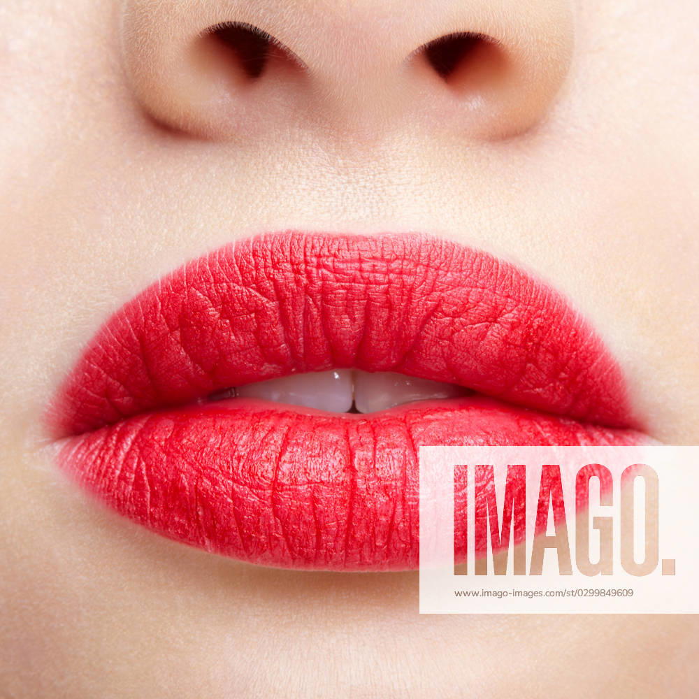 Closeup macro portrait of female part of face. Human woman red lips with day beauty makeup Human mouth and nose. Closeup macro portrait of female part of face. Woman red lips with day beauty makeup. ,model released, Symbolfoto