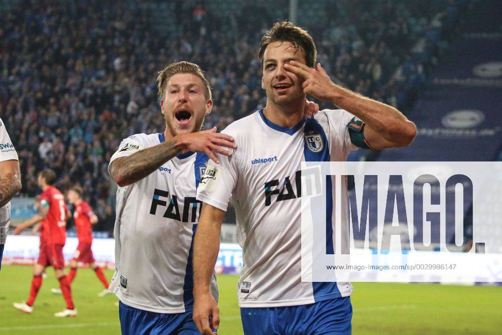 Football 3 League 1 FC Magdeburg SC Paderborn v l Philip Türpitz 1 FC Magdeburg and Christian Beck FC Magdeburg cheer After goal to 1 0 through Christian Beck FC Magdeburg Magdeburg