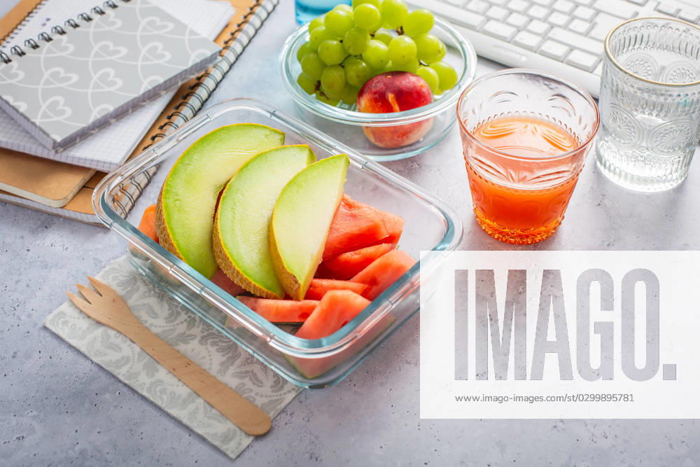 Healthy snack at office workplace Healthy snack at office workplace, organic vegan meals from take away lunch box