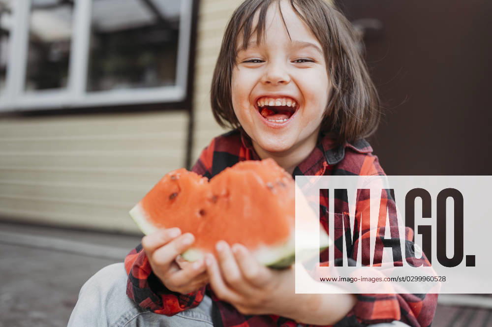 Cheerful boy holding fresh watermelon slice model released, Symbolfoto property released, ANAF01553